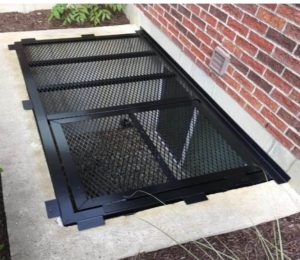 79 x 40 Grate with Escape Hatch on Extra Large Wells